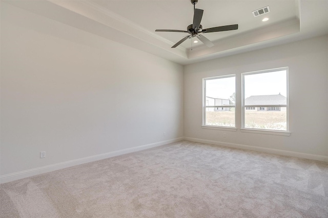 823 Wind River Pass, Azle, TX 76020 - empty room with a raised ceiling, light colored carpet, ceiling fan, baseboards, and recessed lighting