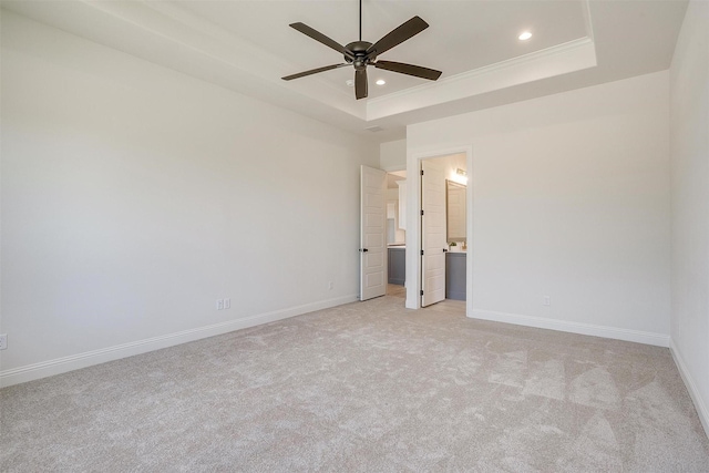 823 Wind River Pass, Azle, TX 76020 - spare room featuring a raised ceiling, a ceiling fan, light colored carpet, baseboards, and recessed lighting