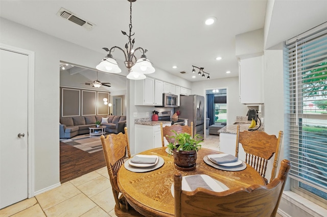 6701 Ridgetop Rd, North Richland Hills, TX 76182 - dining area featuring light tile patterned floors, recessed lighting, healthy amount of natural light, and ceiling fan