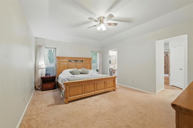 6701 Ridgetop Rd, North Richland Hills, TX 76182 - bedroom with light colored carpet, connected bathroom, and ceiling fan