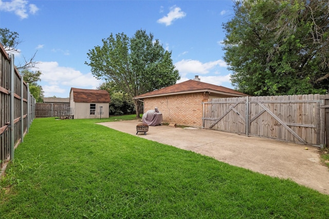 6701 Ridgetop Rd, North Richland Hills, TX 76182 - fenced backyard with a patio, an outbuilding, and a fire pit