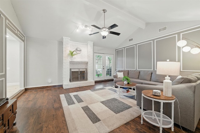 6701 Ridgetop Rd, North Richland Hills, TX 76182 - living room featuring wood finished floors, ceiling fan, french doors, and a fireplace