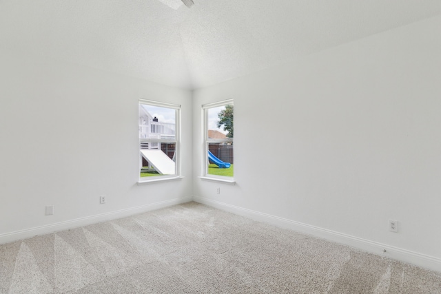 826 Ashley Pl, Mesquite, TX 75181 - spare room with baseboards, carpet flooring, and a textured ceiling