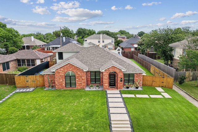 826 Ashley Pl, Mesquite, TX 75181 - view of front facade featuring a gate, a shingled roof, brick siding, and a residential view