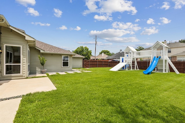 826 Ashley Pl, Mesquite, TX 75181 - view of yard featuring a playground and a patio area