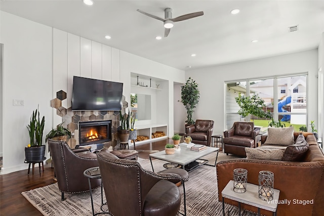 826 Ashley Pl, Mesquite, TX 75181 - living area featuring a ceiling fan, wood finished floors, a large fireplace, recessed lighting, and baseboards