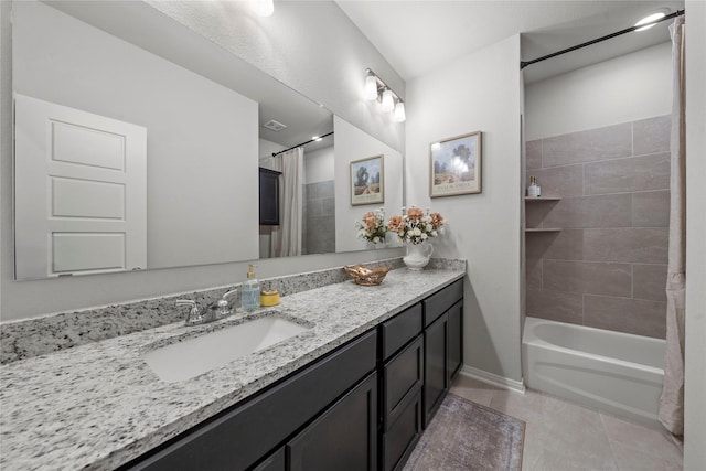 1512 Elise Ave, Waco, TX 76706 - full bath with vanity, tile patterned flooring, shower / bath combo, and baseboards