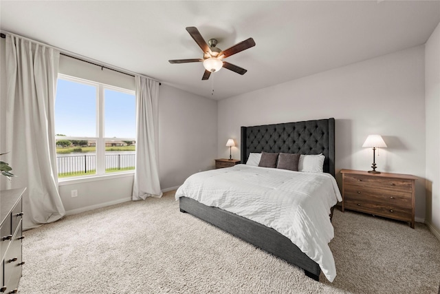 1512 Elise Ave, Waco, TX 76706 - carpeted bedroom with baseboards, ceiling fan, and a water view