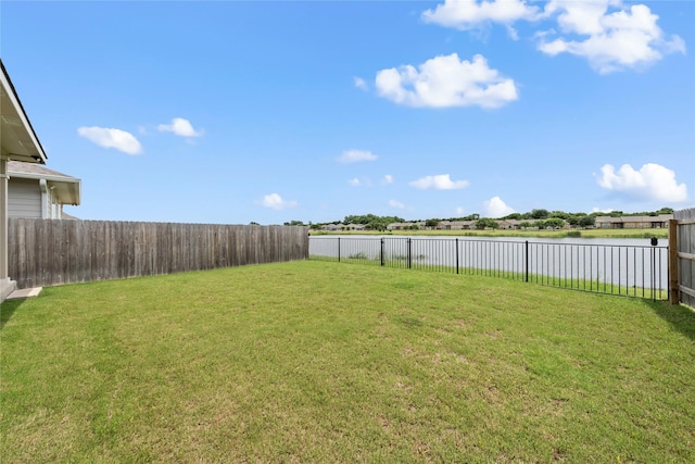 1512 Elise Ave, Waco, TX 76706 - view of yard featuring a water view