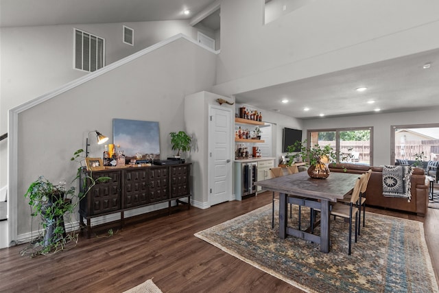 1617 Versailles Dr, Richardson, TX 75081 - dining room with wine cooler, a dry bar, wood finished floors, recessed lighting, and high vaulted ceiling