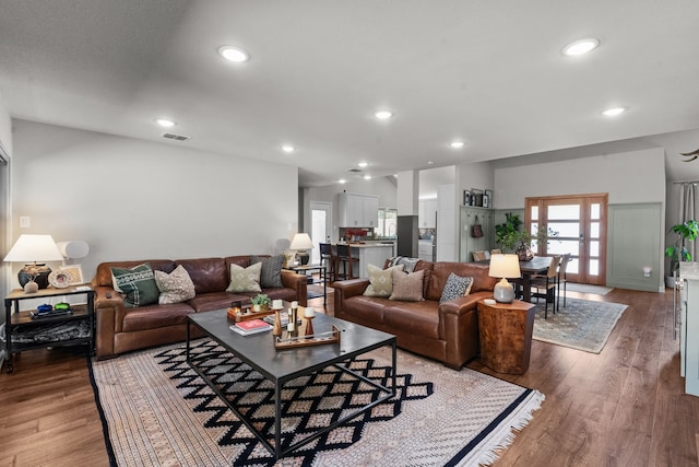 1617 Versailles Dr, Richardson, TX 75081 - living room with french doors, wood finished floors, and recessed lighting