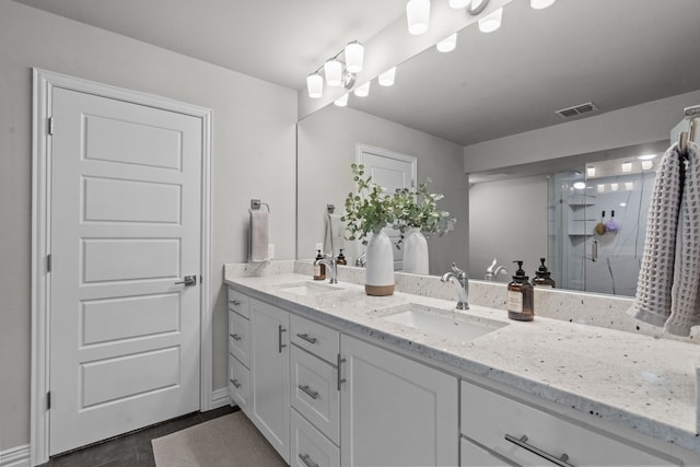 1617 Versailles Dr, Richardson, TX 75081 - full bath with double vanity, a shower with door, and tile patterned flooring