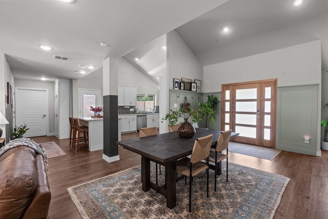 1617 Versailles Dr, Richardson, TX 75081 - dining room with high vaulted ceiling, wood finished floors, and recessed lighting