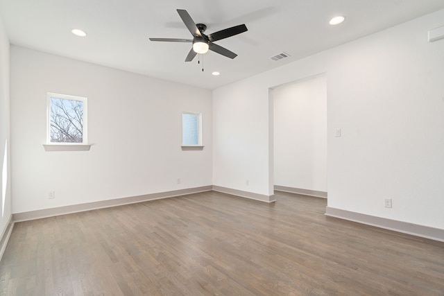 840 Northwood Rd, Fort Worth, TX 76107 - empty room with wood finished floors, a ceiling fan, recessed lighting, and baseboards