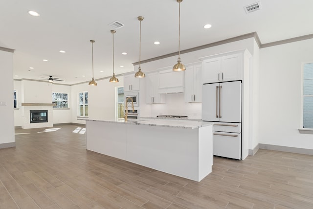 840 Northwood Rd, Fort Worth, TX 76107 - kitchen with high end fridge, ceiling fan, white cabinetry, baseboards, and recessed lighting