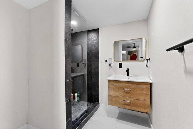 712 W 8th St, Dallas, TX 75208 - bathroom with a stall shower, vanity, ceiling fan, and tile patterned flooring