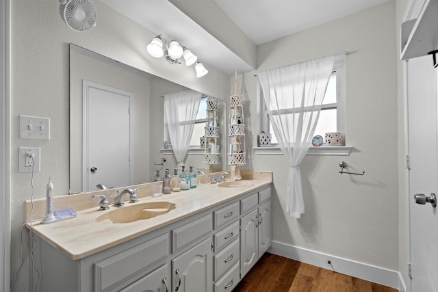 1610 Alpine Pass, Lewisville, TX 75077 - full bath featuring double vanity and wood finished floors