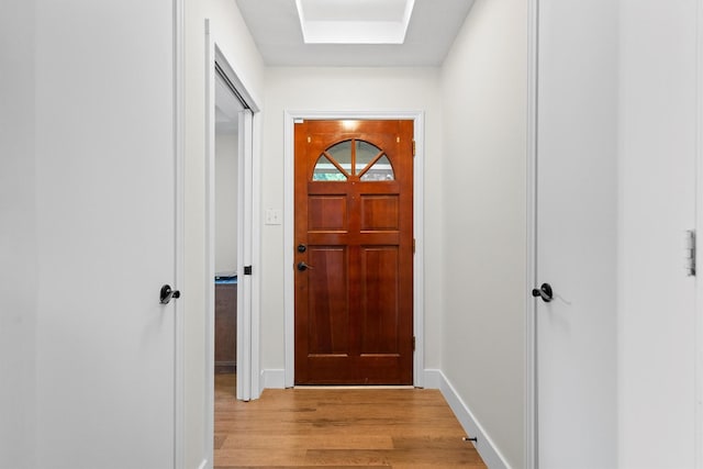 1610 Alpine Pass, Lewisville, TX 75077 - entryway with light wood-style floors and baseboards