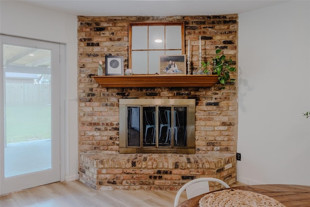 2712 Larkin Ave, Fort Worth, TX 76133 - detailed view of wood finished floors and a fireplace