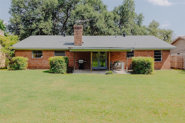 2712 Larkin Ave, Fort Worth, TX 76133 - back of house with french doors, a chimney, and brick siding