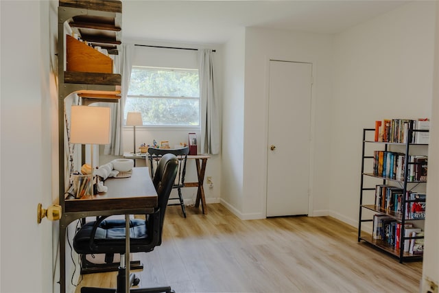2712 Larkin Ave, Fort Worth, TX 76133 - home office with light wood-style flooring and baseboards