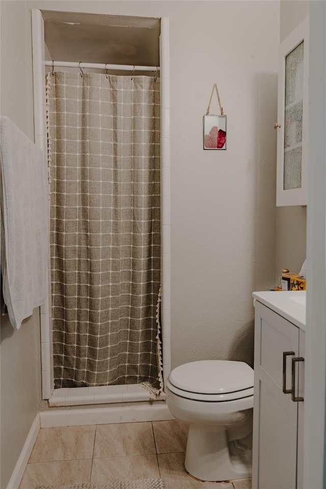 2712 Larkin Ave, Fort Worth, TX 76133 - full bathroom with vanity, toilet, tile patterned flooring, and a shower stall