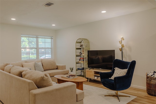 2712 Larkin Ave, Fort Worth, TX 76133 - living room with light wood-type flooring, recessed lighting, and baseboards
