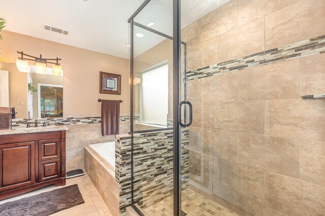 2510 High Pointe Blvd, Mckinney, TX 75071 - full bathroom with a garden tub, vanity, a shower stall, recessed lighting, and tile patterned flooring