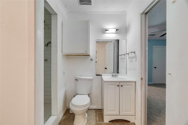 635 N Center St, Blossom, TX 75416 - bathroom with vanity, toilet, a shower stall, and a textured ceiling