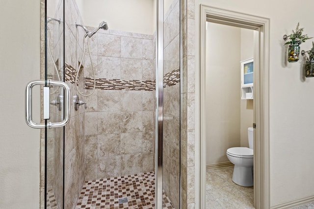 2508 Pioneer Dr, Denton, TX 76210 - bathroom featuring toilet and a shower stall