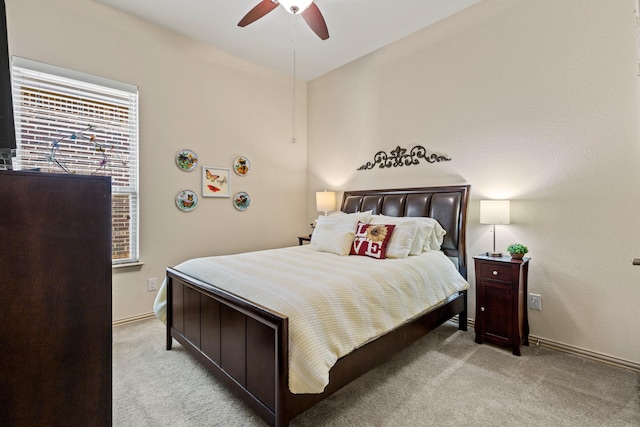 2508 Pioneer Dr, Denton, TX 76210 - bedroom featuring light carpet, baseboards, and ceiling fan