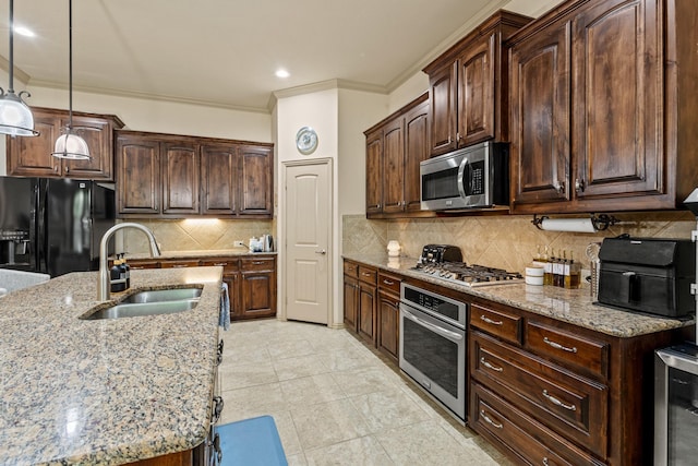 2508 Pioneer Dr, Denton, TX 76210 - kitchen featuring stainless steel appliances, a sink, ornamental molding, light stone counters, and beverage cooler