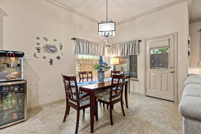 2508 Pioneer Dr, Denton, TX 76210 - dining room featuring beverage cooler, ornamental molding, light tile patterned flooring, a chandelier, and baseboards