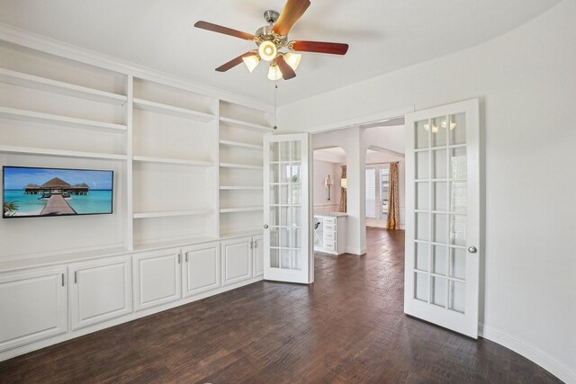 4534 Whispering Lake Dr, Frisco, TX 75036 - unfurnished room with a ceiling fan, dark wood-style flooring, baseboards, and built in shelves