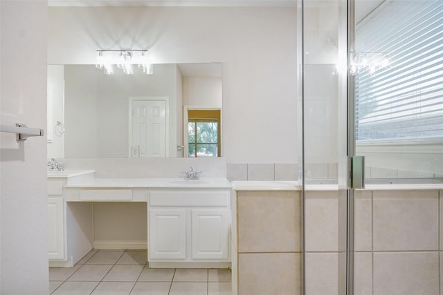 8393 Davis Dr, Frisco, TX 75036 - bathroom with tile patterned flooring, a chandelier, and double vanity