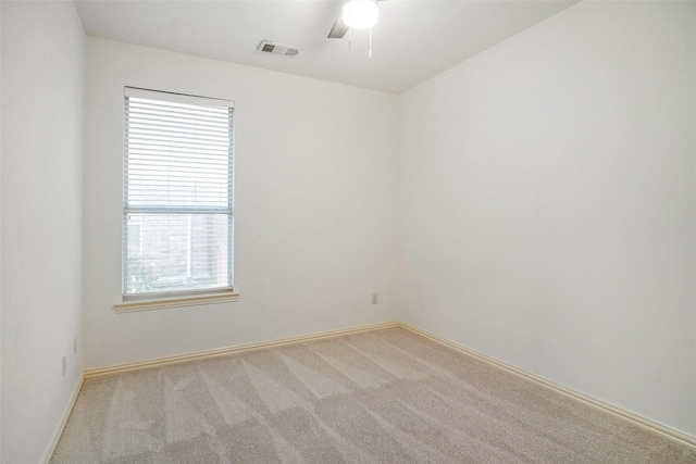 8393 Davis Dr, Frisco, TX 75036 - carpeted spare room with baseboards and ceiling fan