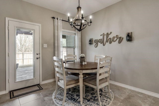 1713 Cattleman St, Van Alstyne, TX 75495 - dining space with a chandelier, baseboards, and light tile patterned floors
