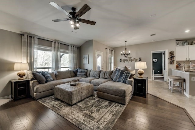1713 Cattleman St, Van Alstyne, TX 75495 - living area with a chandelier, a ceiling fan, hardwood / wood-style flooring, baseboards, and recessed lighting