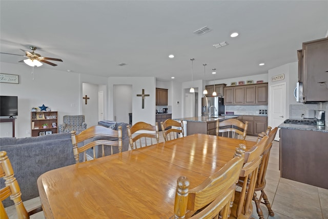 1099 Admiral Dr, Azle, TX 76020 - dining space featuring ceiling fan, recessed lighting, and light tile patterned floors
