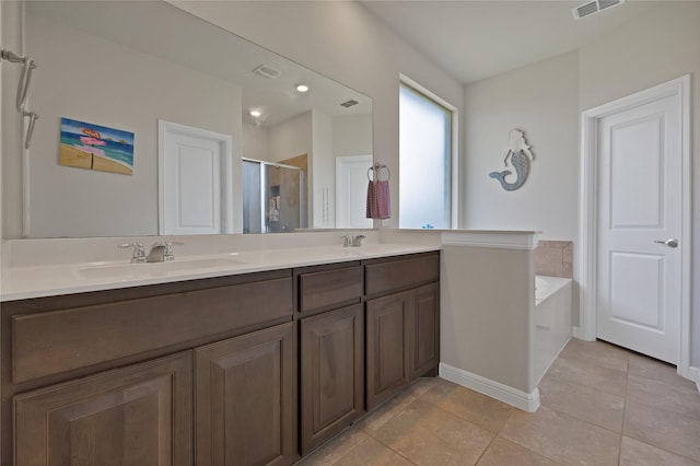 1099 Admiral Dr, Azle, TX 76020 - full bath with a shower stall, double vanity, tile patterned floors, and a bath