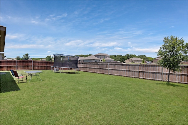 1099 Admiral Dr, Azle, TX 76020 - fenced backyard with a trampoline and a residential view