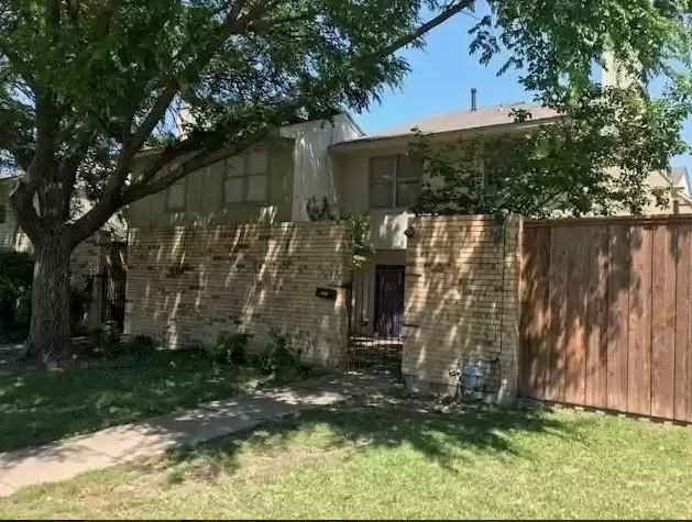 501 Towne House Ln, Richardson, TX 75081 - view of side of property with stucco siding