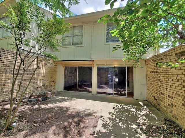 501 Towne House Ln, Richardson, TX 75081 - back of house with a patio