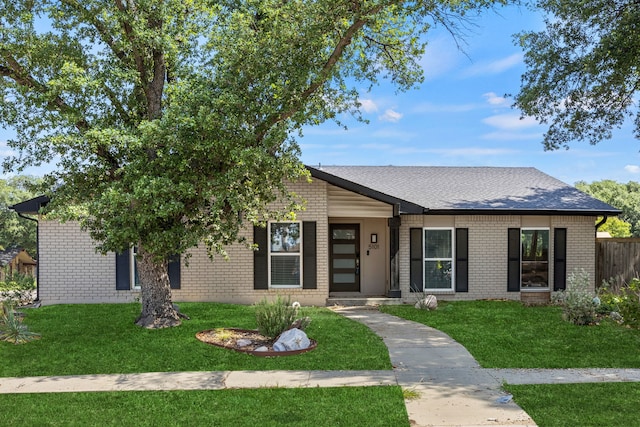 5101 Hetherington Pl, The Colony, TX 75056 - view of front of house featuring brick siding and a shingled roof