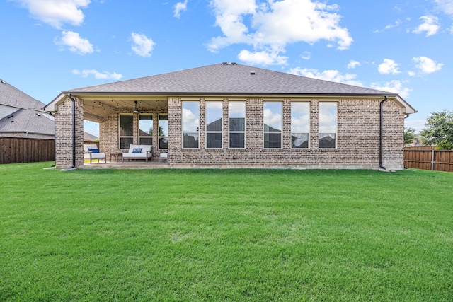 1412 Siena Ln, Rockwall, TX 75032 - back of property featuring a patio and brick siding