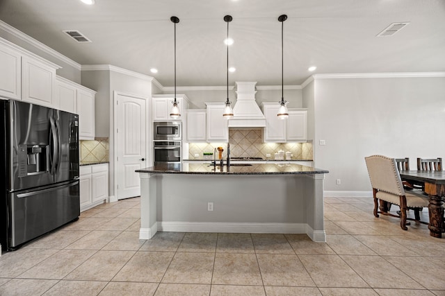 1412 Siena Ln, Rockwall, TX 75032 - kitchen featuring stainless steel appliances, custom exhaust hood, light tile patterned floors, recessed lighting, and backsplash