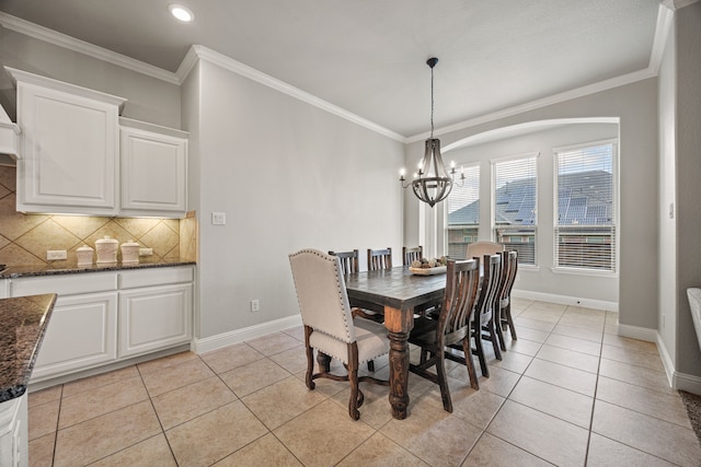 1412 Siena Ln, Rockwall, TX 75032 - dining space with a chandelier, light tile patterned floors, crown molding, baseboards, and recessed lighting