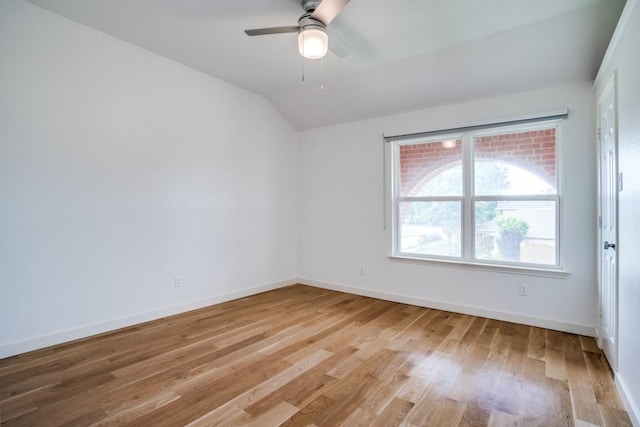1467 Norfolk Ct, Allen, TX 75002 - spare room with lofted ceiling, light wood-style floors, baseboards, and a ceiling fan