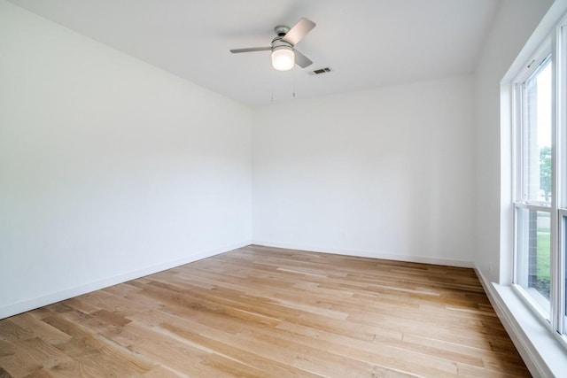 1467 Norfolk Ct, Allen, TX 75002 - spare room featuring light wood finished floors, ceiling fan, and baseboards