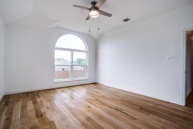 1467 Norfolk Ct, Allen, TX 75002 - spare room featuring a ceiling fan, wood finished floors, lofted ceiling, and baseboards